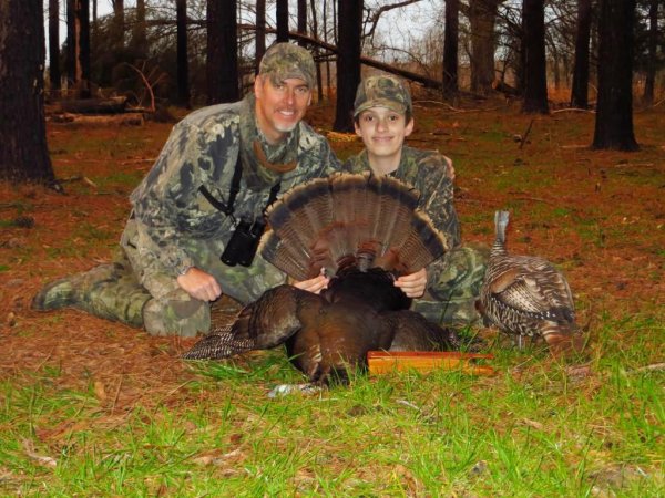 Eric Larson and son Drake with a fine gobbler 